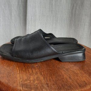 Black leather slides
